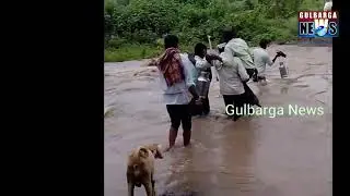 Heavy Rainfall Forces Farmers in Neelur to Risk Lives Crossing Overflowing Stream