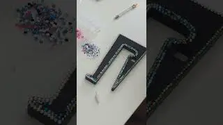 Adding Rhinestones to my Laptop Stand. #rhinestones #rhinestoneart #bling #art