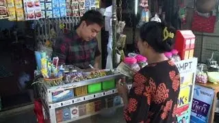 Pocket change: Myanmar banks on mobile money