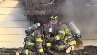 Two people escape a southside fire through second story window