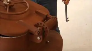 Adjusting the spring tension on a spring-assisted hatch