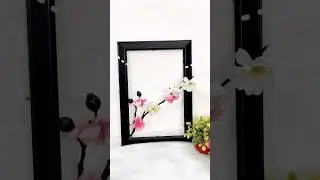 🌸 A spare frame, a small branch, and a little creativity.#art #craftyhome #diy