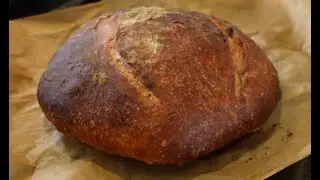 Flat bread, sour dough bread and a butcher block. Red. #116