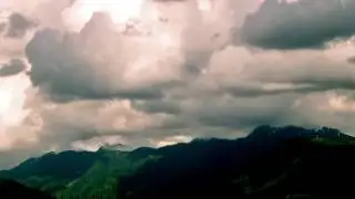 Cloud shadows highlight mountain terrain 40x