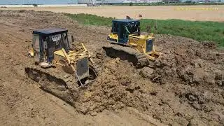 Dozers Push Sticky Soil And Trucks Dumping Sticky Soil Filling Land