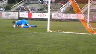 Andrew Welker puts a shot in on the Revolution keeper during the USOC