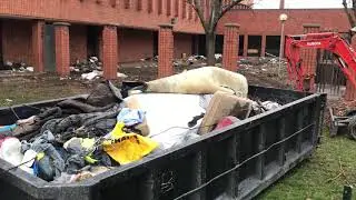 Cleaning up after homeless camp cleared