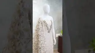 Pure linen unstitched salwar material with v.neck, hand embroidery paired with floral dupatta.