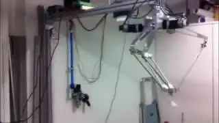 Robot posicionador cinta transporte