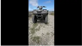 JB on the 2012 Suzuki King Quad 750 AMS M1-Evil tires preparing the riding arena for the next day.