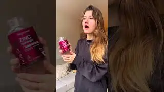Young woman taste testing the WeightWorld Zinc Gummies