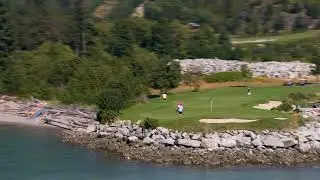 Aerial of people playing golf at Furry Creek Golf Course