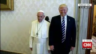 Donald Trump meets Pope Francis. Trying to hold on pope's hand ! disq