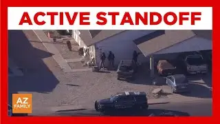 Police standoff underway after woman injured at home in Mesa