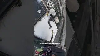 The first-person perspective shows Spider-Man working at heights to dismantle the curtain