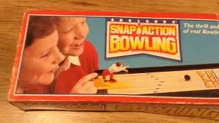 Tabletop Snap Action Bowling game with a movable bowler with a spring-operated arm Shelcore toys