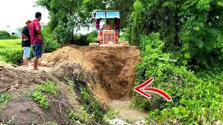Amazing !! Bulldozer working push soil landfill repair road with dump truck unloading soil filling 