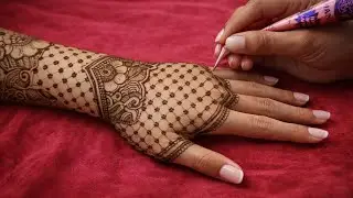 Arabic + Net Pattern Back Hand Mehndi Design