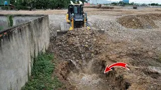 Wonderful SHANTUI Bulldozer Pushing Soil Filling Cracked ground with Dump truck pouring soils