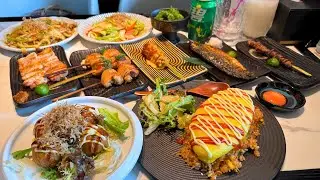 Eating Japanese BBQ Yakitori Skewers Restaurant