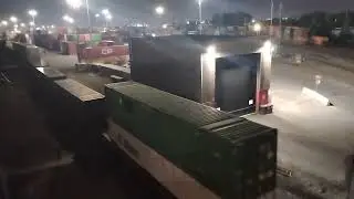 Graveyard shift crew switching intermodal cars at CPKC Montreal Lachine IMS yard