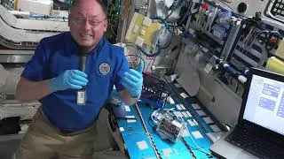 NASA Astronaut Mike Fincke congratulates Genes in Space winners Julia Gross and Isabelle Chuang