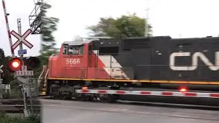 [4K] CN 5666 and CN 2862 Come Roaring Through Brockville Past Park St.'s Railroad Crossing