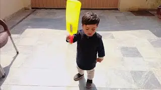 Mustafa playing with bat ball