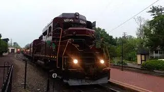 Diesel Engine 2198 leaving the New Hope Railroad Station .