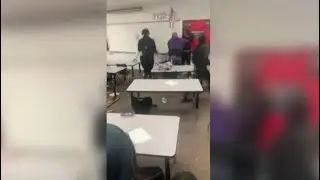 Teacher slams student onto table, shoves him against wall