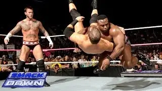 Big E Langston helps CM Punk repel a 
