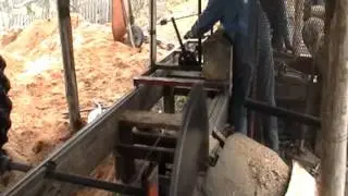 Foley belsaw Sawmill, powered by John Deere 2940