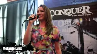 Melanie Lynx at the Conquer Entertainment Booth at MAWC2014