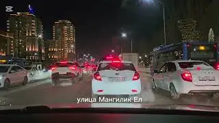 Astana, Feb 2026. Late-evening drive through the streets.