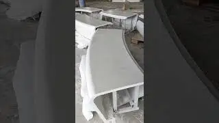 Artistic concrete seating bench in a residential community