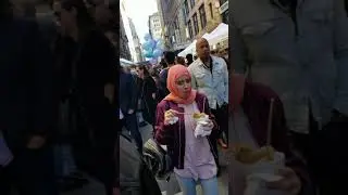 H: A New York City View of the Korean Day Parade and Street Festival in Korea Town.  October 2019