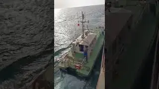 PILOT PATIENTLY WAITING FOR HIS BOAT