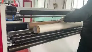 Jumbo roll rewinding machine