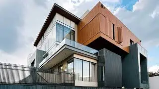The Crest | Modern Metal Facade House with Sliding Louvers