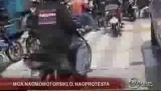 motorcycles vs MMDA on sticker on helmets
