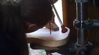 Andrew Allan Guitars drilling thru string holes