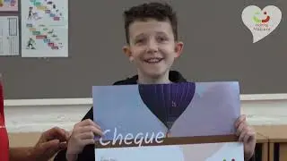 Robbie krijgt cheque