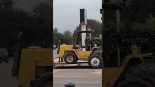 The Eagle Picher R80T is a rough terrain forklift designed for lifting and moving heavy materials.