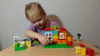 Что скрывается внутри детского сада? Распаковка конструктора Лего Дупло 10833!