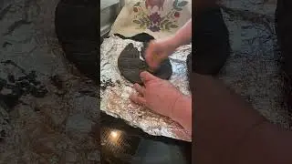 Sanding a primitive muslin Raven doll