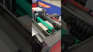 automatic pre-opened rolling courier bag making machine showing on chinaplas2023 in shenzhen city