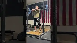 Cross arm barbell front squat