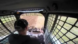 Bobcat T750 Resurfacing Lawn With Harley Rake