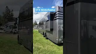 features an STX Motorhome, which is a luxury RV often built on a Scania truck chassis.