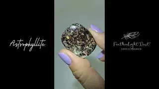 Astrophyllite cabochon with golden-bronze metallic inclusions - AST20